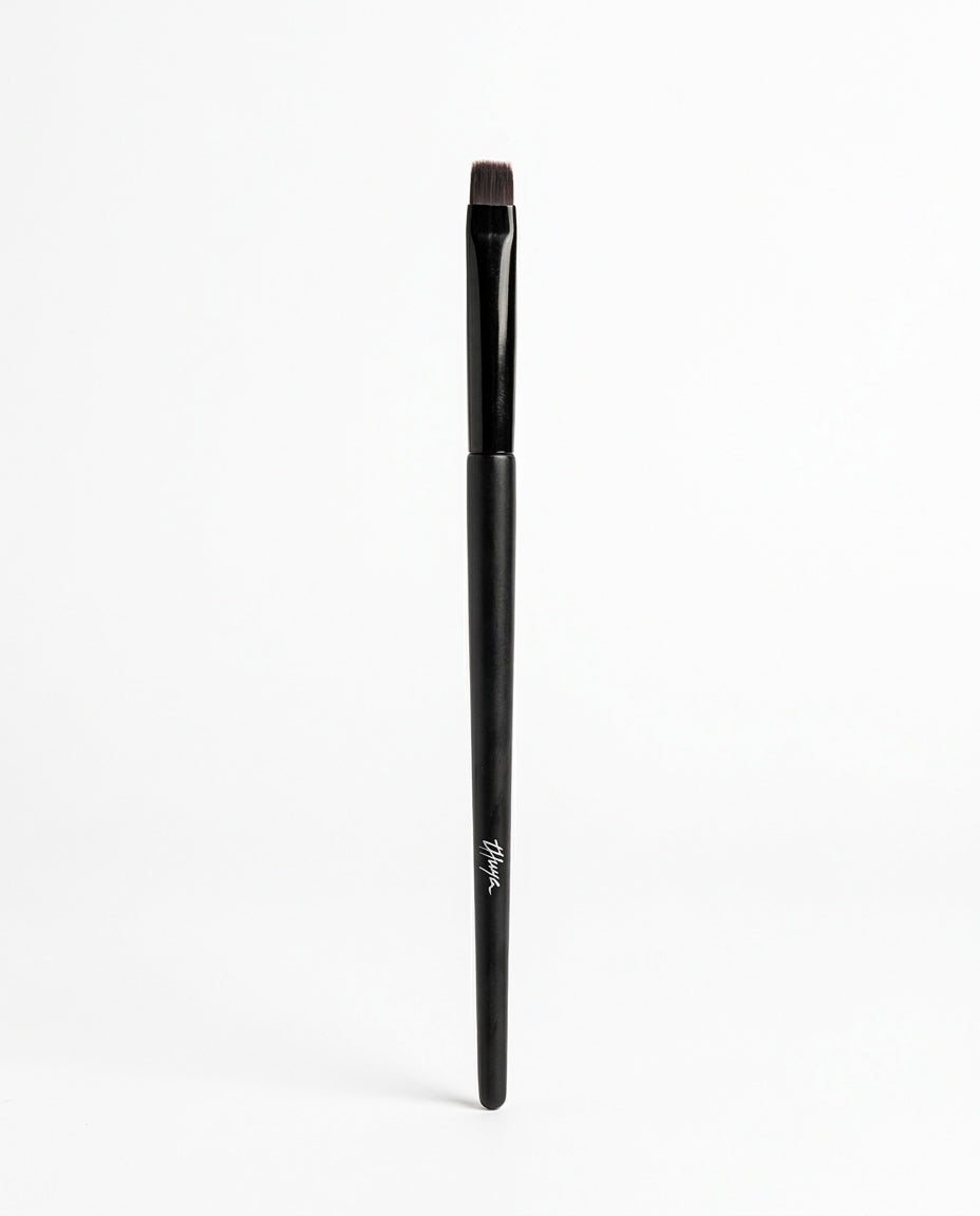 Thuya Lifting Balm Brush with black handle and flat angled bristles