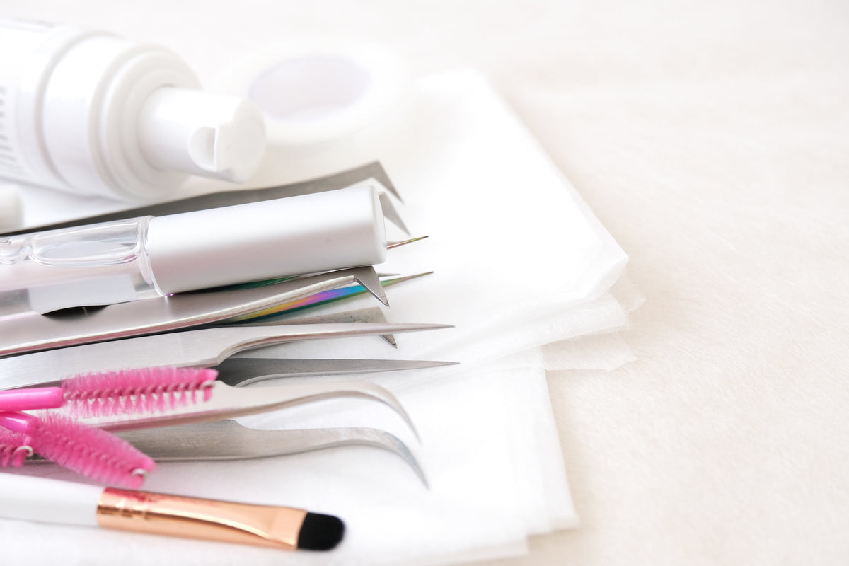 Lash extension supplies and tools ready for sanitization. Cartel Lash