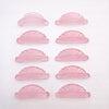Pink jelly lash lift rods arranged by size in two columns 