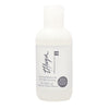 A white bottle of Thuya Professional Line eye make-up remover water-based formula, 100ml, on a solid white background.
