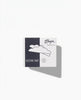 A square product box for Thuya Professional Line Silicone Pads, size S, featuring a split black and white design.